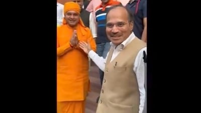 Congress leader Adhir Ranjan Chowdhury and BJP MP Yogi Balaknath outside Parliament (ANI) Congress leader Adhir Ranjan Chowdhury and BJP MP Yogi Balaknath outside Parliament (ANI)