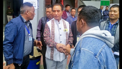 ZPM chief and party's chief ministerial candidate Lalduhoma being greeted by his supporters in Mizoram on Monday. (ANI)