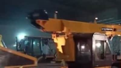 JCB machines stationed outside a warehouse inn Karnataka's Vijaypura. (PTI)