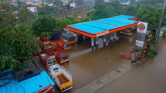 Chennai: Vehicles stuck at a fuel station flooded due to heavy rain owing to Cyclone Michaung, in Chennai, Monday, Dec. 4, 2023.&nbsp;(PTI)