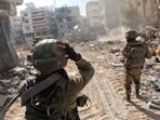 Israeli soldiers operate in the Gaza Strip amid the ongoing conflict between Israel and the Palestinian Islamist group Hamas. (Reuters)