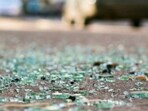 Glass pieces shattered after an accident. Glass pieces shattered after an accident.