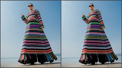 Karisma's striking rainbow dress is guaranteed to uplift your spirits with its vibrant colors. This attention-grabbing attire is sourced from the renowned fashion designer Rahul Mishra's collection. (Instagram/@therealkarismakapoor) Karisma's striking rainbow dress is guaranteed to uplift your spirits with its vibrant colors. This attention-grabbing attire is sourced from the renowned fashion designer Rahul Mishra's collection. (Instagram/@therealkarismakapoor)