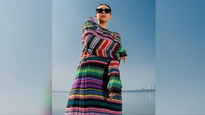Karisma kept her accessories minimal to let her outfit shine, styling her look with a pair of black cat-eye sunglasses, diamond stud earrings and a pair of black high heels. (Instagram/@therealkarismakapoor) Karisma kept her accessories minimal to let her outfit shine, styling her look with a pair of black cat-eye sunglasses, diamond stud earrings and a pair of black high heels. (Instagram/@therealkarismakapoor)