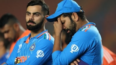 India's Virat Kohli and Rohit Sharma look dejected after losing the ICC Cricket World Cup final (REUTERS)