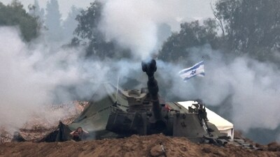 Israel-Hamas War:  An Israeli artillery unit operates at the border with Gaza, amid the ongoing conflict between Israel and Hamas. (Reuters)