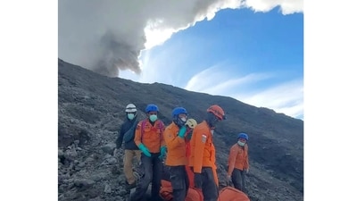 In this undated photo released Dec. 5, 2023, by the Indonesian National Search and Rescue Agency (BASARNAS), rescuers evacuate the body of a climber killed in Mount Marapi's eruption in Agam, West Sumatra, Indonesia. Rescuers searching the hazardous slopes of Indonesia's Marapi volcano found more bodies among the climbers caught by a surprise eruption two days ago. (BASARNAS via AP) (AP) In this undated photo released Dec. 5, 2023, by the Indonesian National Search and Rescue Agency (BASARNAS), rescuers evacuate the body of a climber killed in Mount Marapi's eruption in Agam, West Sumatra, Indonesia. Rescuers searching the hazardous slopes of Indonesia's Marapi volcano found more bodies among the climbers caught by a surprise eruption two days ago. (BASARNAS via AP) (AP)