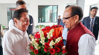 Madhya Pradesh chief minister Shivraj Singh Chouhan being greeted by Congress state president Kamal Nath after BJP's victory in the state assembly elections in Bhopal on Monday. (PTI) Madhya Pradesh chief minister Shivraj Singh Chouhan being greeted by Congress state president Kamal Nath after BJP's victory in the state assembly elections in Bhopal on Monday. (PTI)