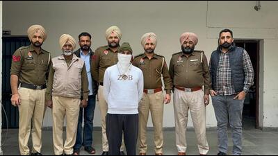 Punjab Police constable Ashish Kumar in the custody of Bathinda police on Tuesday. (HT Photo)