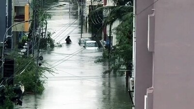 Chennai: A view of the waterlogged road following heavy rainfall triggered by cyclone Michaung, in Chennai on Monday. (ANI) Chennai: A view of the waterlogged road following heavy rainfall triggered by cyclone Michaung, in Chennai on Monday. (ANI)