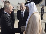 United Arab Emirates Foreign Minister Abdullah bin Zayed Al Nahyan, right, greets Russian President Vladimir Putin upon his arrival.