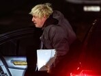 Britain's former Prime Minister Boris Johnson arrives at the UK Covid-19 Inquiry, in west London. (AFP)