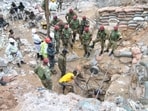 Zambian Army special forces officers follow the rescue operation of miners Zambian Army special forces officers follow the rescue operation of miners