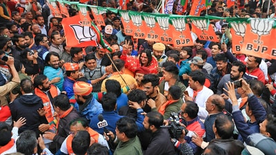 BJP candidate Balmukund Acharya arrives at party office after his victory in Rajasthan Assembly elections, in Jaipur. (PTI) BJP candidate Balmukund Acharya arrives at party office after his victory in Rajasthan Assembly elections, in Jaipur. (PTI)
