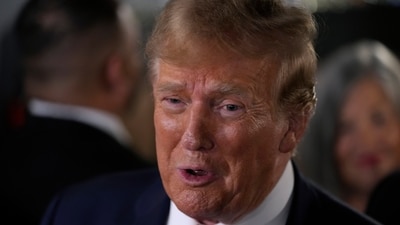 Former President Donald Trump talks to supporters during a stop at the Front Street Pub & Eatery, Tuesday, Dec. 5, 2023, in Davenport, Iowa. (AP) Former President Donald Trump talks to supporters during a stop at the Front Street Pub & Eatery, Tuesday, Dec. 5, 2023, in Davenport, Iowa. (AP)