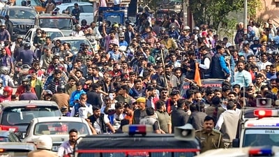 Rashtriya Rajput Karni Sena supporters shout slogans during a protest against the killing of their leader Sukhdev Singh Gogamedi, in Ajmer, (PTI)