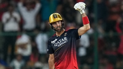 Royal Challengers Bangalore batter Glenn Maxwell celebrates after scoring a half-century during the IPL 2023 match against Lucknow Super Giants (PTI)