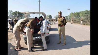 Police check a car during operation Seal-V on Wednesday. (HT Photo) Police check a car during operation Seal-V on Wednesday. (HT Photo)