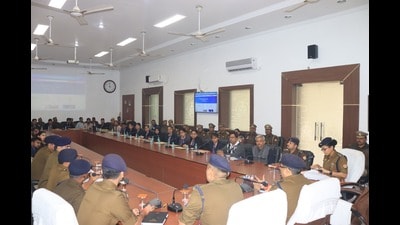 Police officials and students during the launch of SPEL initiative in Prayagraj (HT) Police officials and students during the launch of SPEL initiative in Prayagraj (HT)
