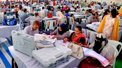 Polling officials collect EVMs and other polling materials on the eve of the Telangana Assembly election, at a distribution centre in Hyderabad, Wednesday, Nov. 29, 2023 (PTI)