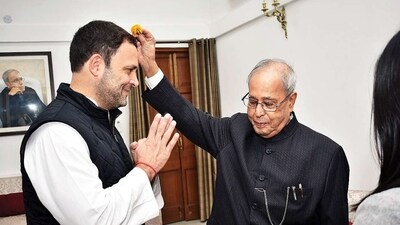 Rahul Gandhi (L). Pranab Mukherjee Rahul Gandhi (L). Pranab Mukherjee