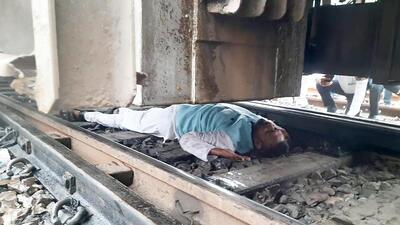 The protester who was pulled out others, unscathed, after the train screeched to a halt, according to eyewitnesses. (Santosh Kumar/HT) The protester who was pulled out others, unscathed, after the train screeched to a halt, according to eyewitnesses. (Santosh Kumar/HT)