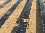 The Adani Group's plant will cover a vast 726 square kilometres land mass and generate 30 GW of power. The Adani Group's plant will cover a vast 726 square kilometres land mass and generate 30 GW of power.