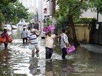 Volunteers distribute food amid floods after heavy rainfall in the aftermath of Cyclone Michaung, in Chennai. Volunteers distribute food amid floods after heavy rainfall in the aftermath of Cyclone Michaung, in Chennai.