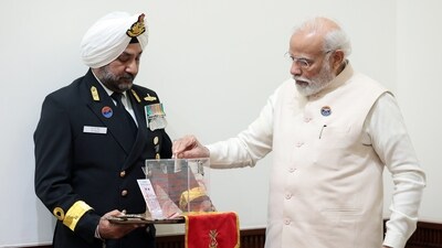PM Modi makes a contribution to the Armed Forces Flag Day Fund on Armed Forces Flag Day in New Delhi. (ANI) PM Modi makes a contribution to the Armed Forces Flag Day Fund on Armed Forces Flag Day in New Delhi. (ANI)