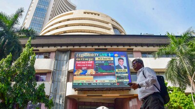 Mumbai: A man walks past the Bombay Stock Exchange (BSE) building. (PTI)