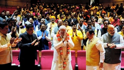 New Delhi: Prime Minister Narendra Modi being felicitated by BJP National President JP Nadda during the BJP Parliamentary Party meeting. (PTI) New Delhi: Prime Minister Narendra Modi being felicitated by BJP National President JP Nadda during the BJP Parliamentary Party meeting. (PTI)