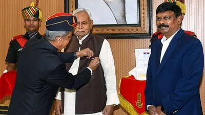Bihar Chief Minister Nitish Kumar receives a badge on the occasion of Armed Forces Flag Day. (PTI) Bihar Chief Minister Nitish Kumar receives a badge on the occasion of Armed Forces Flag Day. (PTI)