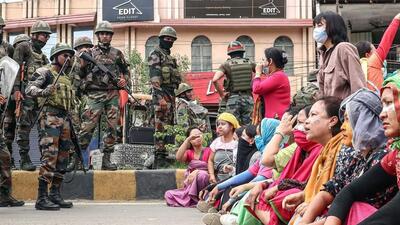 Paramilitary personnel stand guard as Kuki tribe stage protest against the mass burial of people killed in Manipur’s ethnic violence (File Photo) Paramilitary personnel stand guard as Kuki tribe stage protest against the mass burial of people killed in Manipur’s ethnic violence (File Photo)