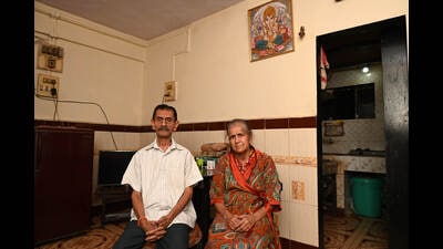 Retired professor Rekha Chatterjee lives with her husband Gurudas and their son in a 150-sq-ft flat in Airoli after a smooth-talking fraud urged her to invest her life’s savings in a flat in Vasai. (Bachchan Kumar/ HT PHOTO) Retired professor Rekha Chatterjee lives with her husband Gurudas and their son in a 150-sq-ft flat in Airoli after a smooth-talking fraud urged her to invest her life’s savings in a flat in Vasai. (Bachchan Kumar/ HT PHOTO)