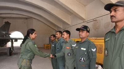 Squadron Leader Mohana Singh interacts with the ground crew before proceeding on a MiG-21 Bison sortie from Nal airbase (HT) Squadron Leader Mohana Singh interacts with the ground crew before proceeding on a MiG-21 Bison sortie from Nal airbase (HT)