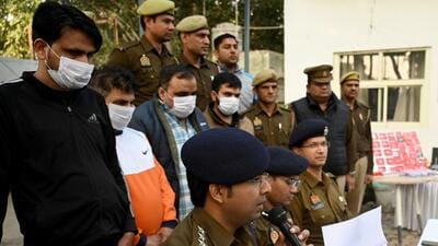 The four suspects (in white masks) were arrested by the Noida police from Trinagar in Delhi on Thursday. (Sunil Ghosh/HT Photo) The four suspects (in white masks) were arrested by the Noida police from Trinagar in Delhi on Thursday. (Sunil Ghosh/HT Photo)