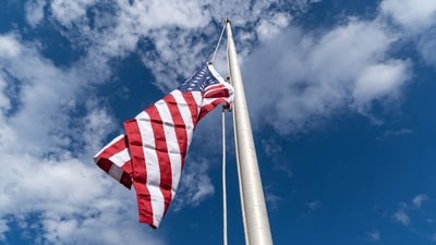 PLAINS, GEORGIA - NOVEMBER 20: Us flag fly at half mast (Getty Images via AFP)
