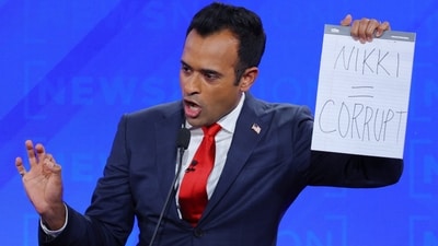 Republican presidential candidate and businessman Vivek Ramaswamy holds up a handwritten sign referring to fellow candidate and former U.S. Ambassador to the United Nations Nikki Haley as he speaks during the fourth Republican candidates' debate of the 2024 U.S. presidential campaign hosted by NewsNation at the University of Alabama in Tuscaloosa, Alabama, U.S. December 6, 2023. REUTERS/Brian Snyder (REUTERS)