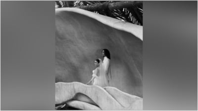 For her wedding ceremony, Vanessa chose a sleek and modern Vera Wang pearl-white gown inspired by the '90s supermodels. She wore a light ivory chartreuse bias-cut slip dress with a plunging back, spaghetti straps, a cowl neckline, and a floor-length hem. Minimal accessories, dewy makeup, and intimate details accentuated Vanessa's wedding look. (Instagram) For her wedding ceremony, Vanessa chose a sleek and modern Vera Wang pearl-white gown inspired by the '90s supermodels. She wore a light ivory chartreuse bias-cut slip dress with a plunging back, spaghetti straps, a cowl neckline, and a floor-length hem. Minimal accessories, dewy makeup, and intimate details accentuated Vanessa's wedding look. (Instagram)