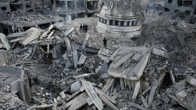 Palestinians inspect rubble after Israeli airstrikes hit a mosque in Gaza. (AP) Palestinians inspect rubble after Israeli airstrikes hit a mosque in Gaza. (AP)