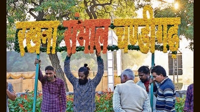 Workers giving final touches to the arrangements for the 35th Annual Chrysanthemum Show 2023 at Terraced Garden, Sector 33, Chandigarh on a sunny Thursday. (HT PHOTO)