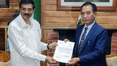 Lalduhoma (right) was sworn in by Mizoram Governor Hari Babu Kambhampati on Friday as the state's chief minister. (ANI) Lalduhoma (right) was sworn in by Mizoram Governor Hari Babu Kambhampati on Friday as the state's chief minister. (ANI)