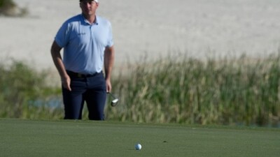Austria's Sepp Straka walks towards his golf ball on the 17th hole green during the final round of the Hero World Challenge PGA Tour at the Albany Golf Club, in New Providence, Bahamas (AP) Austria's Sepp Straka walks towards his golf ball on the 17th hole green during the final round of the Hero World Challenge PGA Tour at the Albany Golf Club, in New Providence, Bahamas (AP)