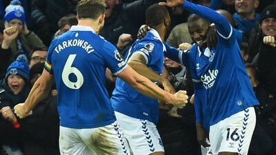 Everton's French midfielder #16 Abdoulaye Doucoure (R) celebrates scoring the team's second goal during the English Premier League football match between Everton and Newcastle United (AFP) Everton's French midfielder #16 Abdoulaye Doucoure (R) celebrates scoring the team's second goal during the English Premier League football match between Everton and Newcastle United (AFP)