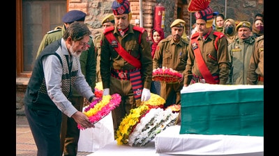 Father of slain J&K inspector, Masroor Ahmad Wani, lays a wreath at his mortal remains in Srinagar on Friday. (PTI) Father of slain J&K inspector, Masroor Ahmad Wani, lays a wreath at his mortal remains in Srinagar on Friday. (PTI)