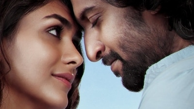 Mrunal and Nani in a still from Hi Nanna Mrunal and Nani in a still from Hi Nanna