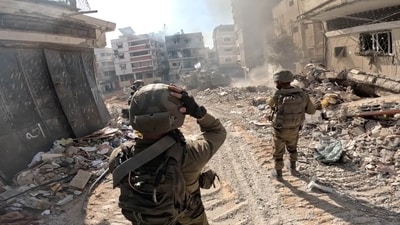 Israeli soldiers operate in the Gaza Strip amid the ongoing conflict between Israel and Hamas. ((Reuters))