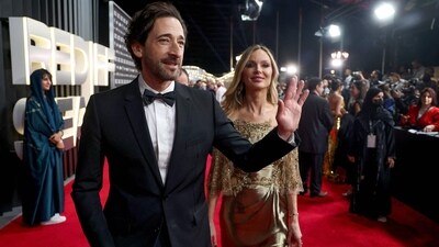 At the Red Sea International Film Festival (RSFF) closing ceremony, actor Adrien Brody and his girlfriend,-actor Georgina Chapman, arrive on the red carpet. She was dressed to impress in a gold dress, while Adrien looked dapper in a tuxedo. Georgina was previously married to Harvey Weinstein, former film producer and convicted sex offender. (AFP) At the Red Sea International Film Festival (RSFF) closing ceremony, actor Adrien Brody and his girlfriend,-actor Georgina Chapman, arrive on the red carpet. She was dressed to impress in a gold dress, while Adrien looked dapper in a tuxedo. Georgina was previously married to Harvey Weinstein, former film producer and convicted sex offender. (AFP)