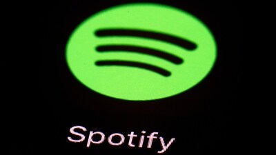 FILE- This March 20, 2018, file photo shows the Spotify app on an iPad in Baltimore. Spotify’s chief financial officer, Paul Vogel, is leaving next year, the music streaming service said, Friday, Dec. 8, 2023, — just days after the company announced its third round of layoffs for 2023. (AP Photo/Patrick Semansky, File) FILE- This March 20, 2018, file photo shows the Spotify app on an iPad in Baltimore. Spotify’s chief financial officer, Paul Vogel, is leaving next year, the music streaming service said, Friday, Dec. 8, 2023, — just days after the company announced its third round of layoffs for 2023. (AP Photo/Patrick Semansky, File)