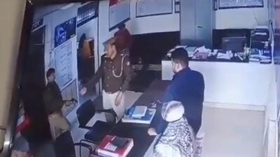 UP woman accidentally shot in head by cop in Aligarh (Twitter) UP woman accidentally shot in head by cop in Aligarh (Twitter)
